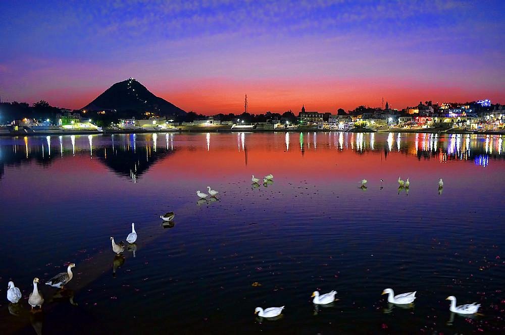 Pushkar Lake with 52 ghats and pilgrims performing rituals during Pushkar Fair