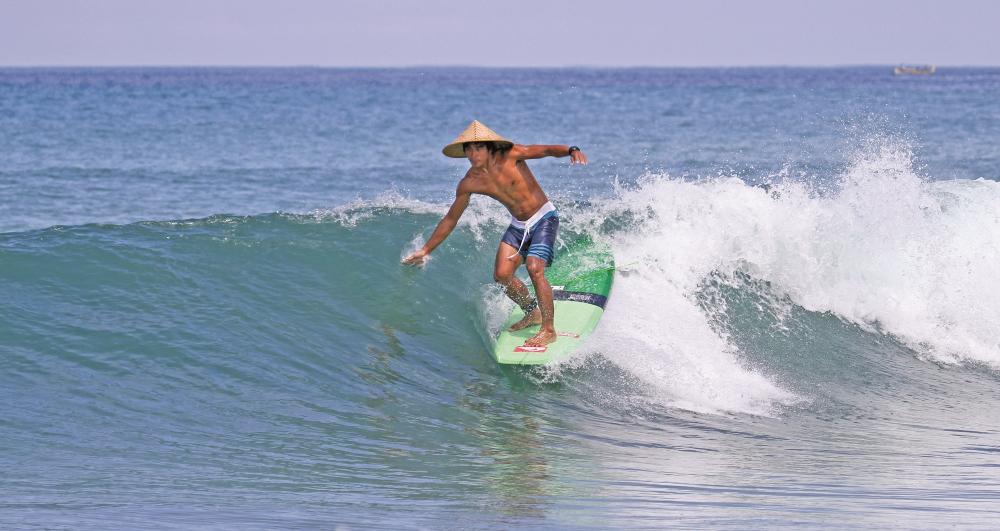 Surfers at Legian Beach
