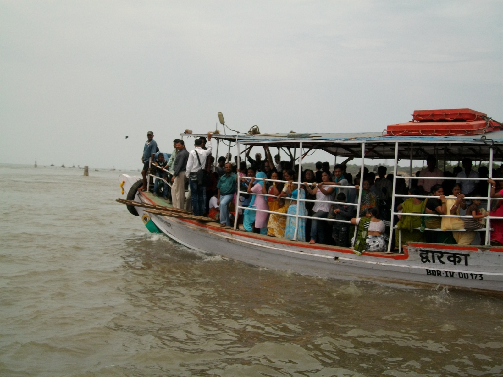 Ferry boat crossing from Versova to Madh Island with blue water