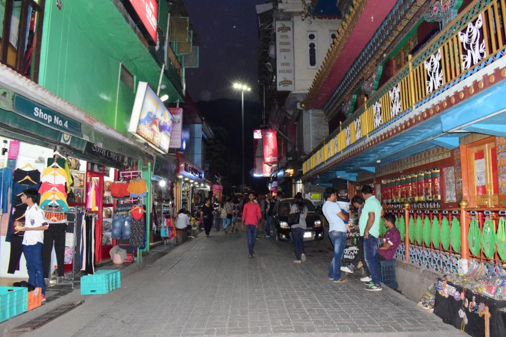 McLeodganj market street with mountain backdrop