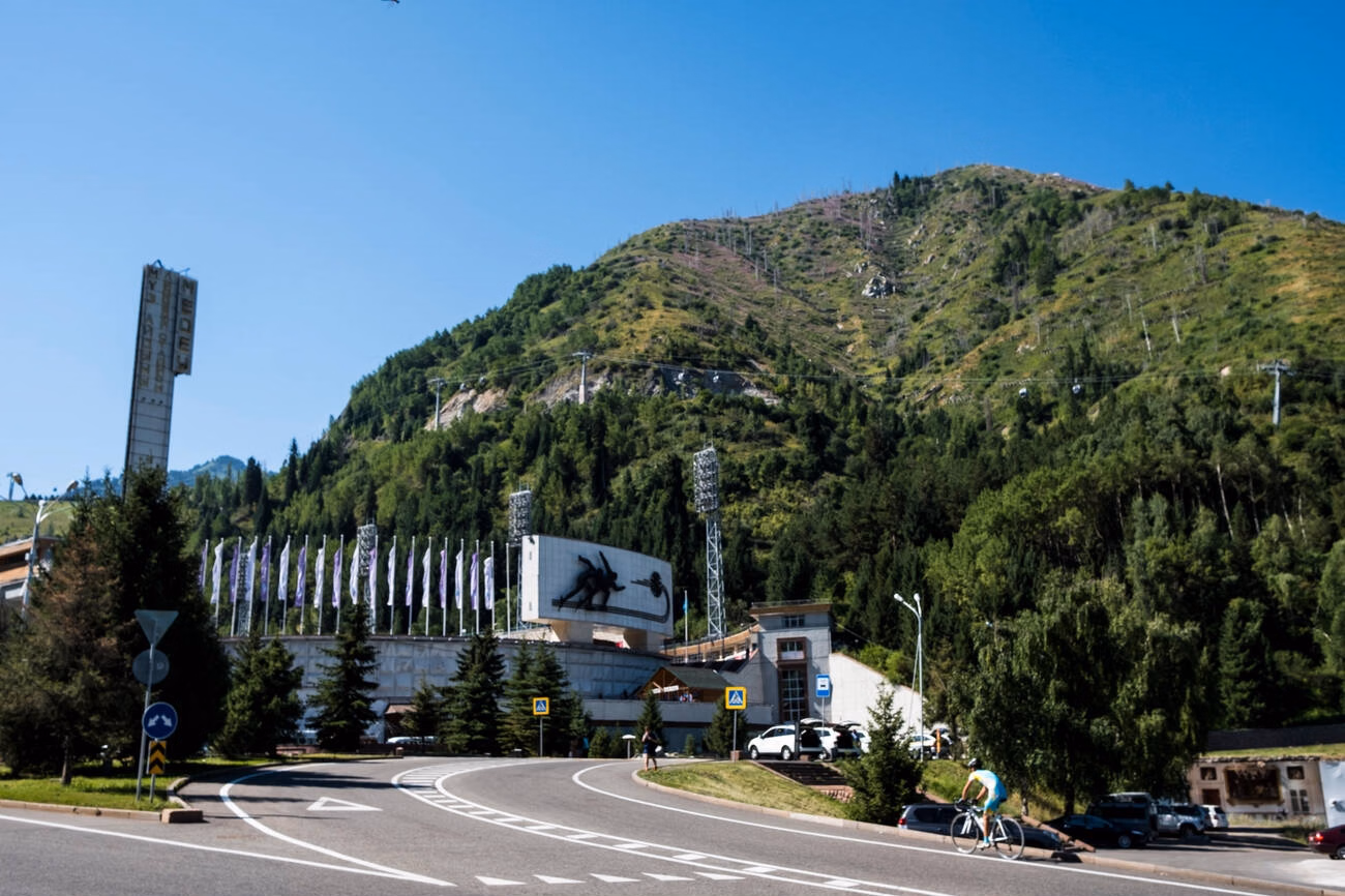 Scenic mountain road from Almaty to Medeu with views of the city below