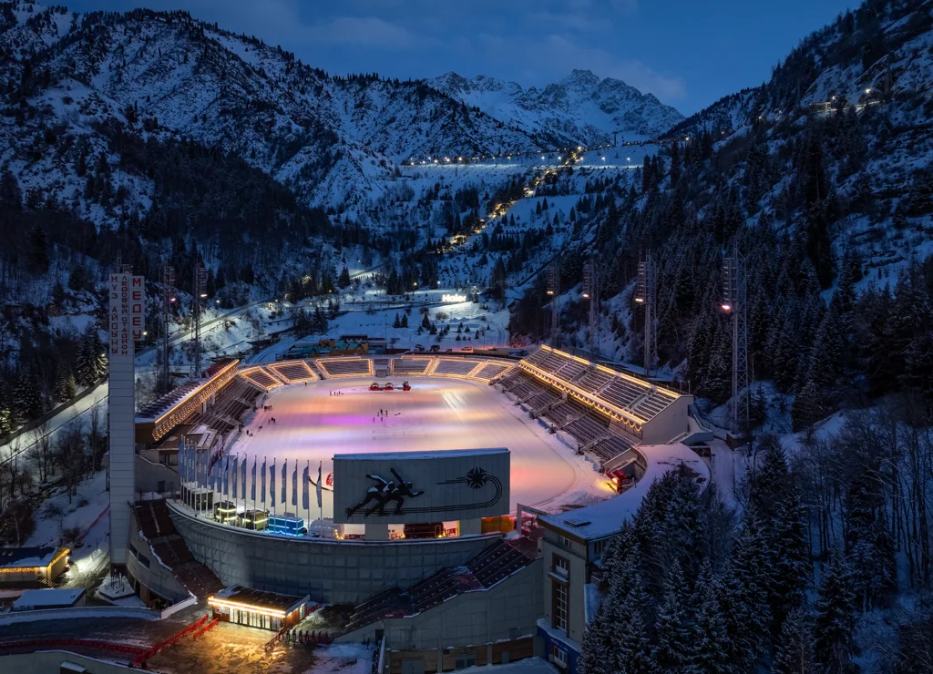Stunning mountain views from Medeu with snow-capped peaks surrounding the skating rink