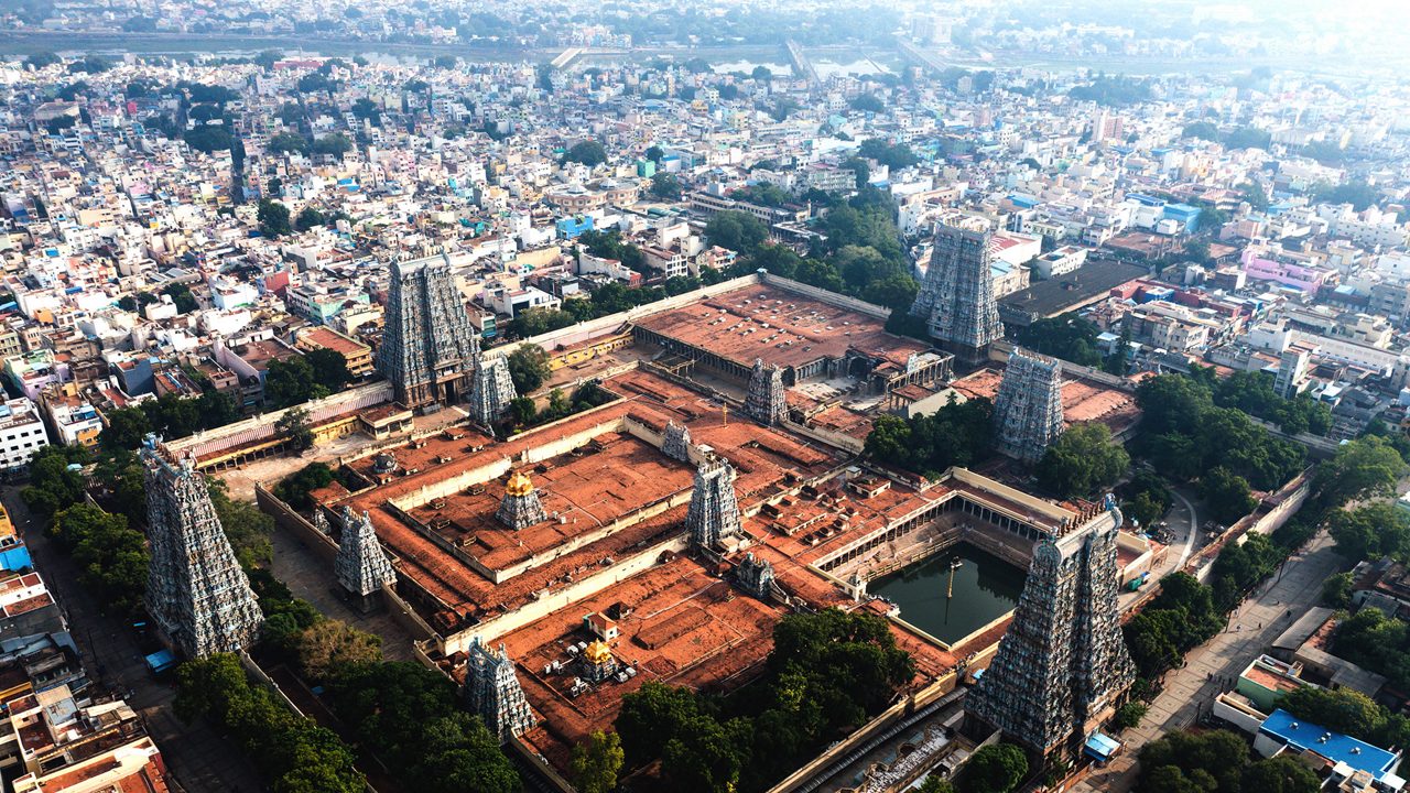 Aerial view of Madurai city with temple towers visible in the distance