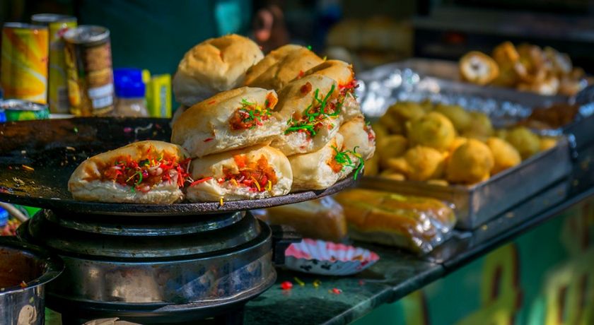 Crowd navigating through Mohammed Ali Road food stalls