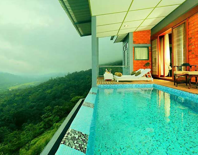 Munnar honeymoon landscape with rolling tea gardens and misty hills