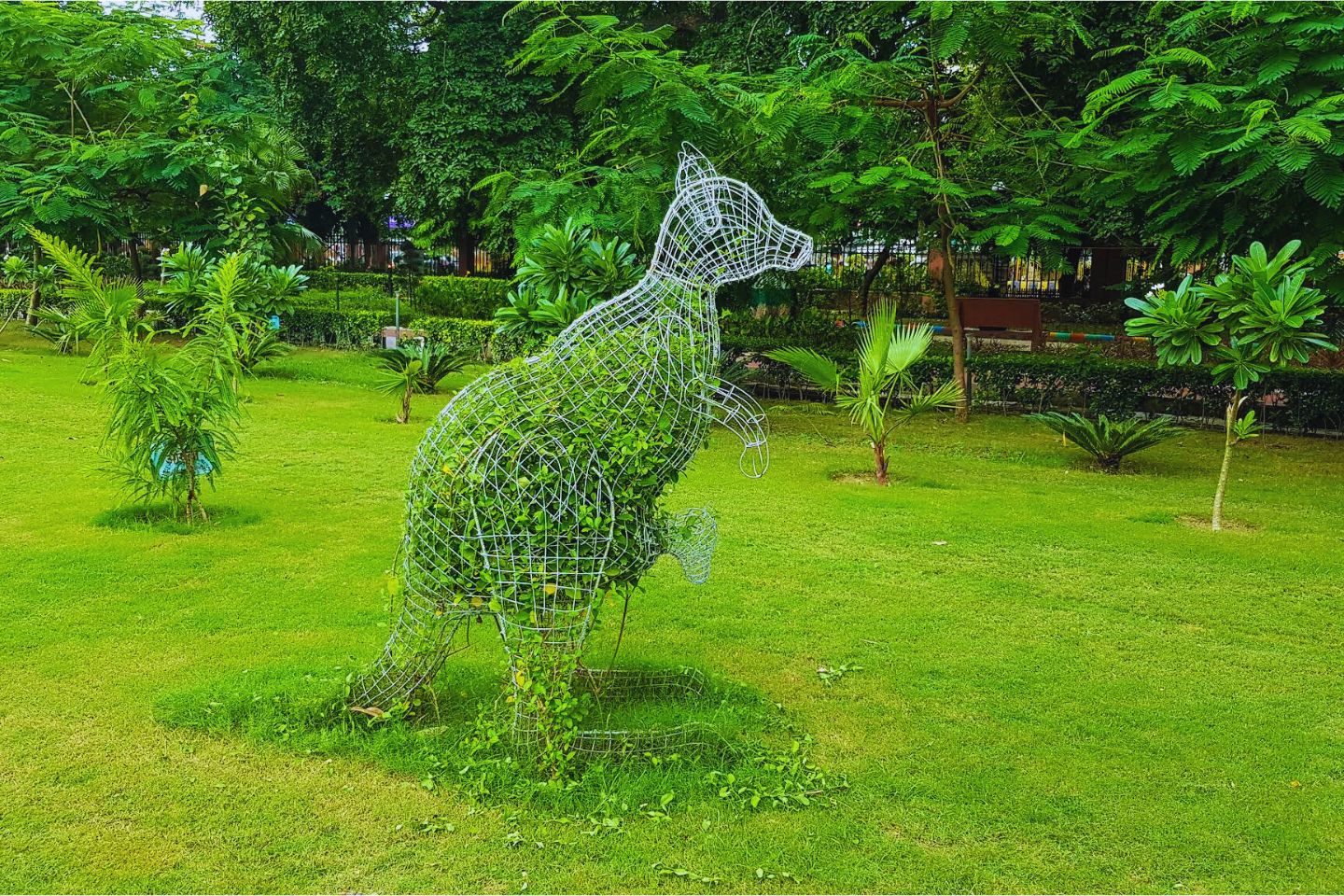 Beautifully landscaped gardens of Nana Rao Park with flower beds and manicured lawns