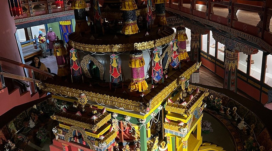 Ancient Buddhist statues and religious artifacts displayed at Ta Dzong National Museum