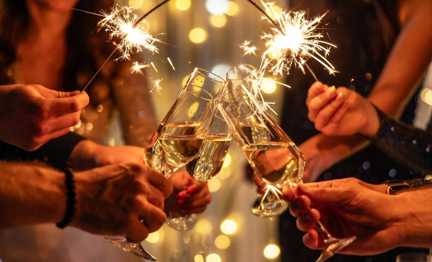 Times Square ball drop and Brazil beach celebrations