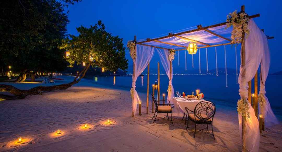 Romantic evening dining setup on Andaman beach