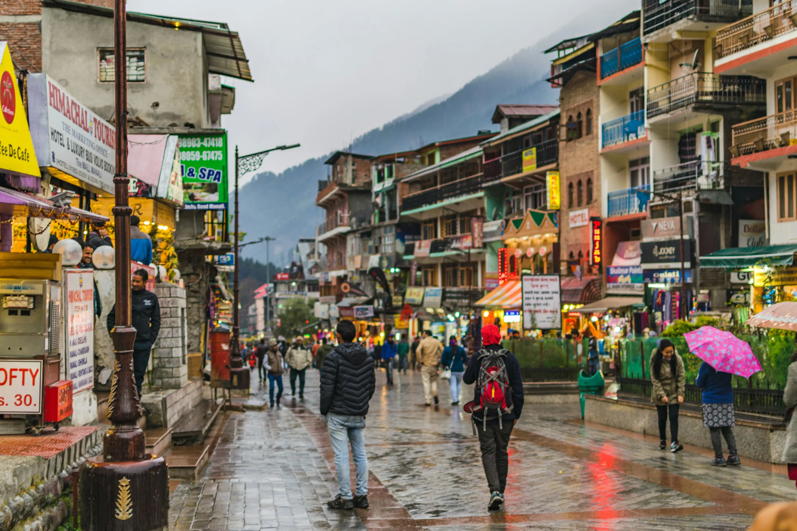Old Manali village lanes with wooden houses and mountain backdrop