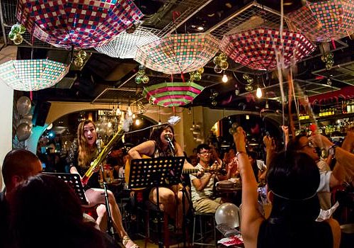 Evening entertainment and nightlife atmosphere on Orchard Road