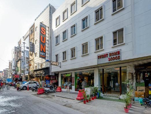 Budget hotel facade in Paharganj with travelers