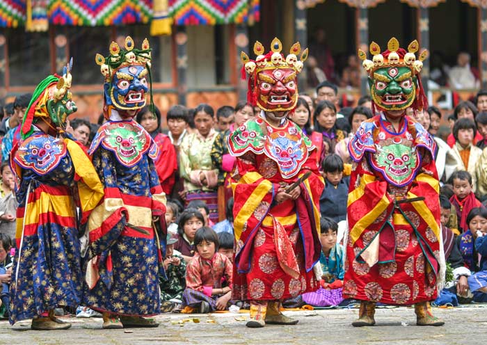 Traditional mask dance performance at Paro Tshechu Bhutan