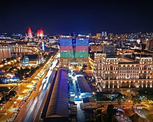 Baku nightlife skyline with modern clubs and old city lights