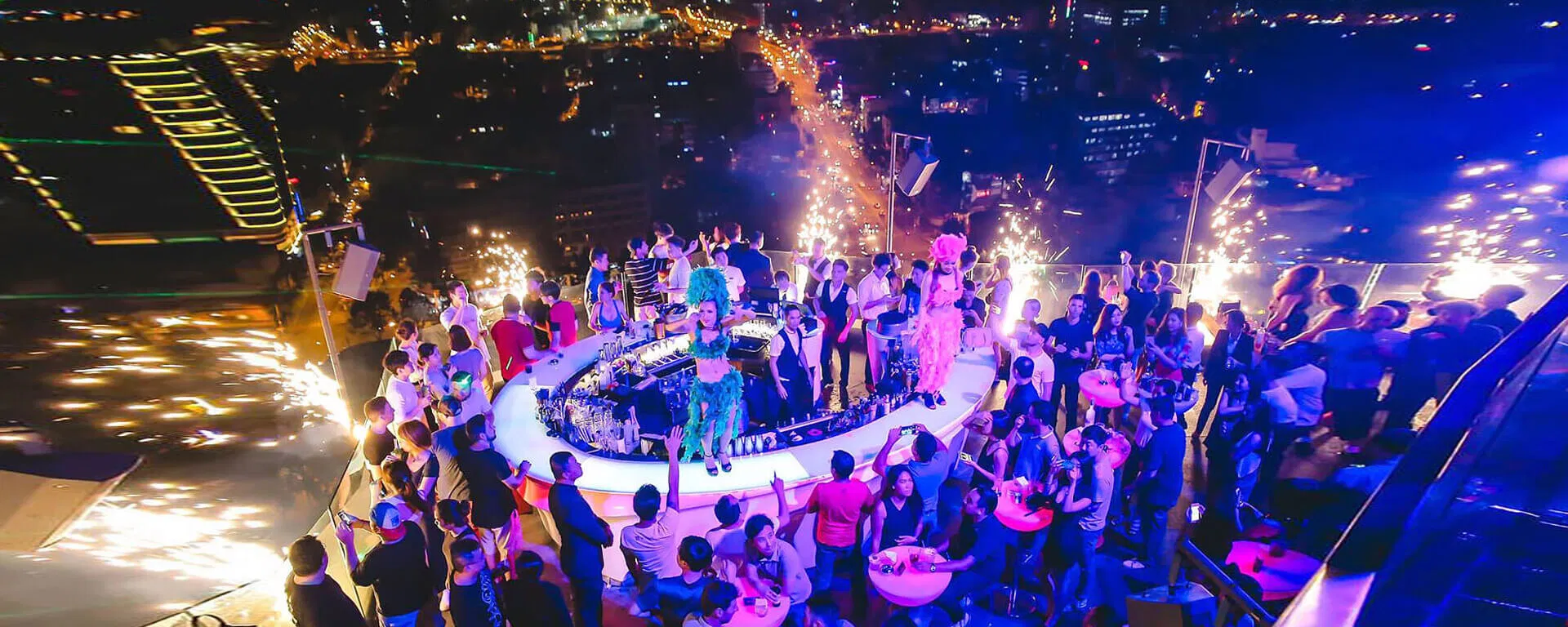 Rooftop nightlife in Baku with skyline and Flame Towers view