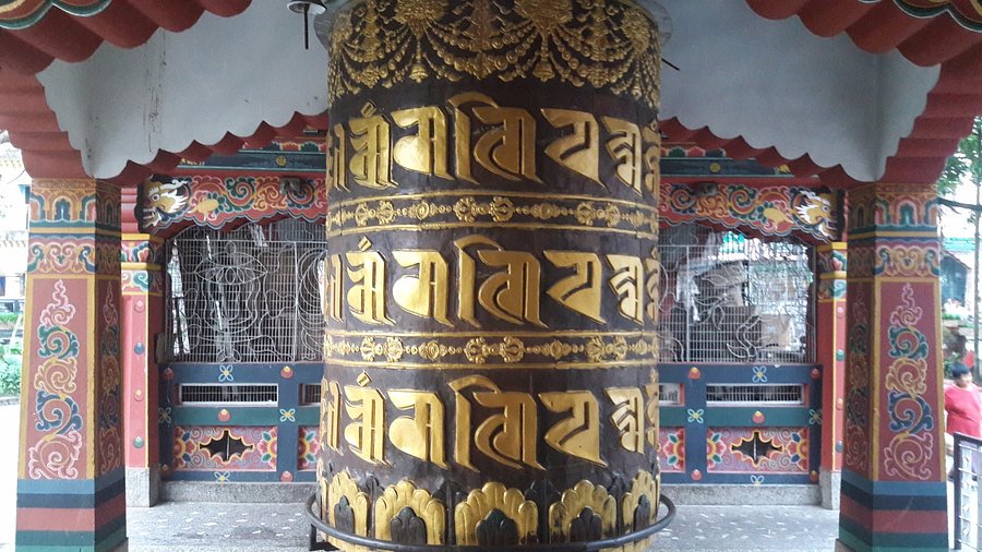 Zangto Pelri Lhakhang monastery in Phuentsholing with traditional Bhutanese architecture and prayer flags