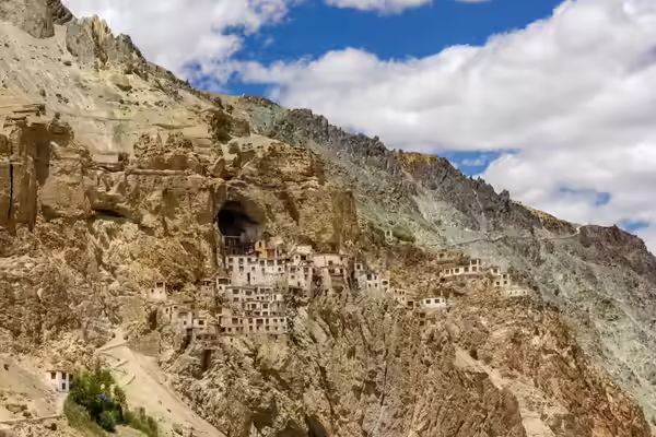 Phugtal Monastery carved into cliffside caves along Lungnak River gorge in Zanskar Ladakh