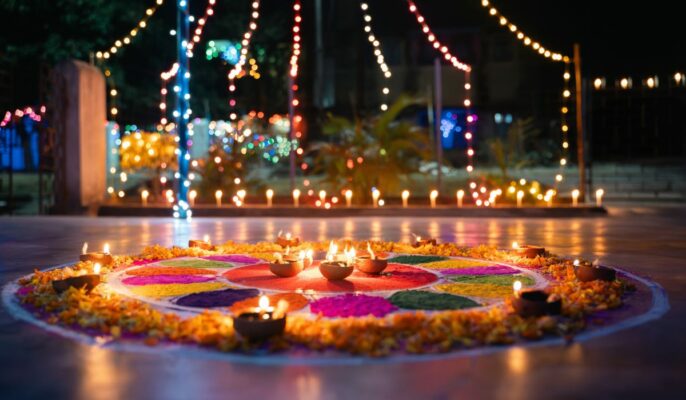 Spectacular Diwali celebrations with rows of illuminated diyas and fireworks display in India