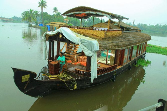 Houseboat and village canals in Alleppey backwaters