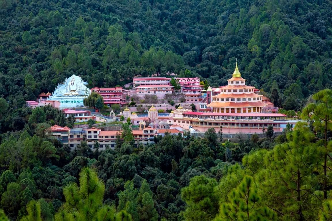 Almora ridge town overview with layered hills and traditional Kumaon landscape