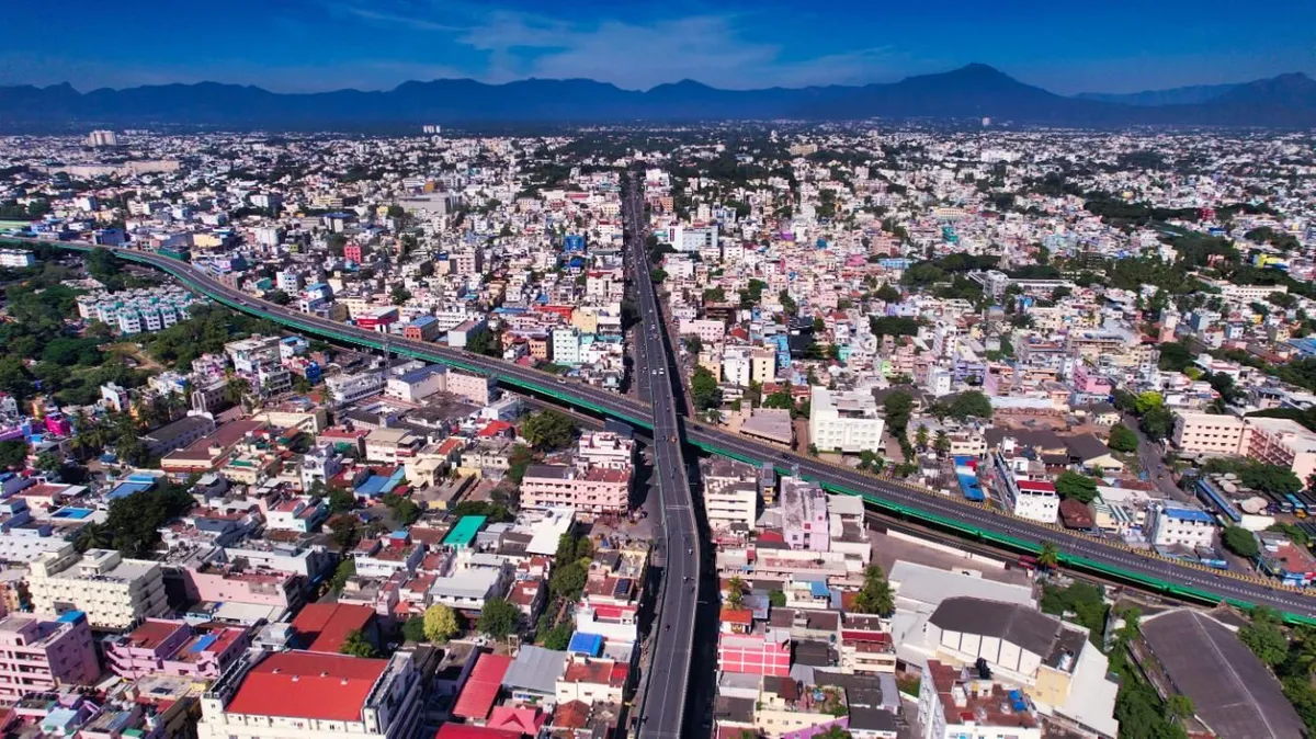 Coimbatore cityscape with textile mills and temples