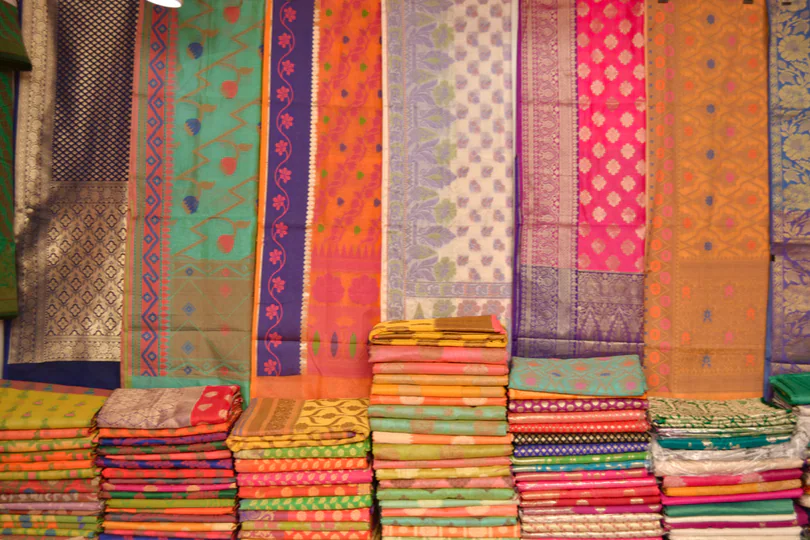 Textile market scene in Coimbatore with fabric shops
