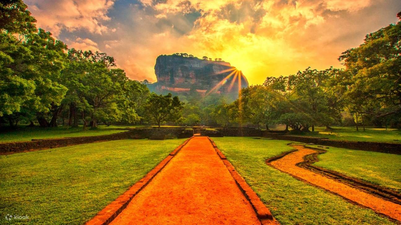 Sunrise view from Pidurangala Rock showing Sigiriya in distance