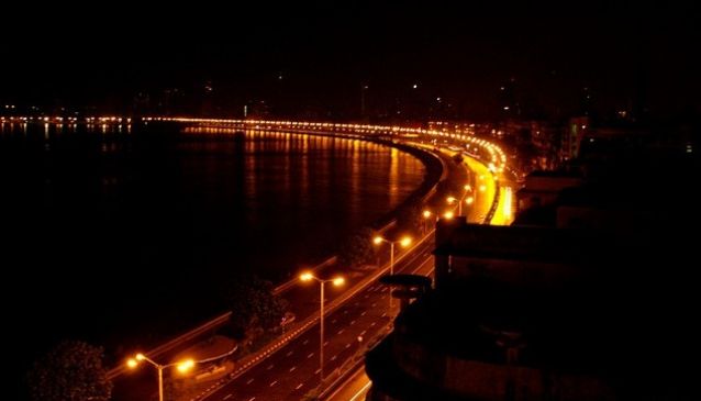 Necklace Road and Hussain Sagar lights at night in Hyderabad