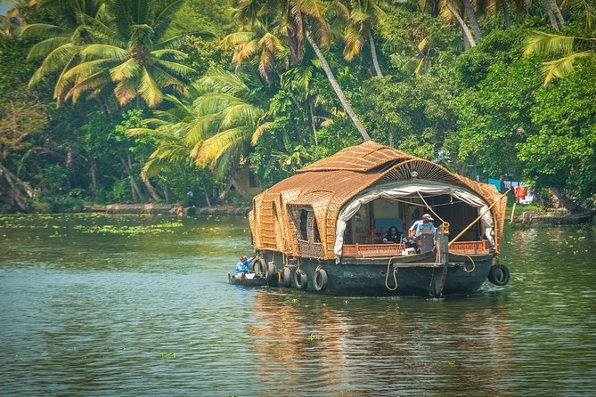 Houseboat cruising in Alleppey backwaters during monsoon