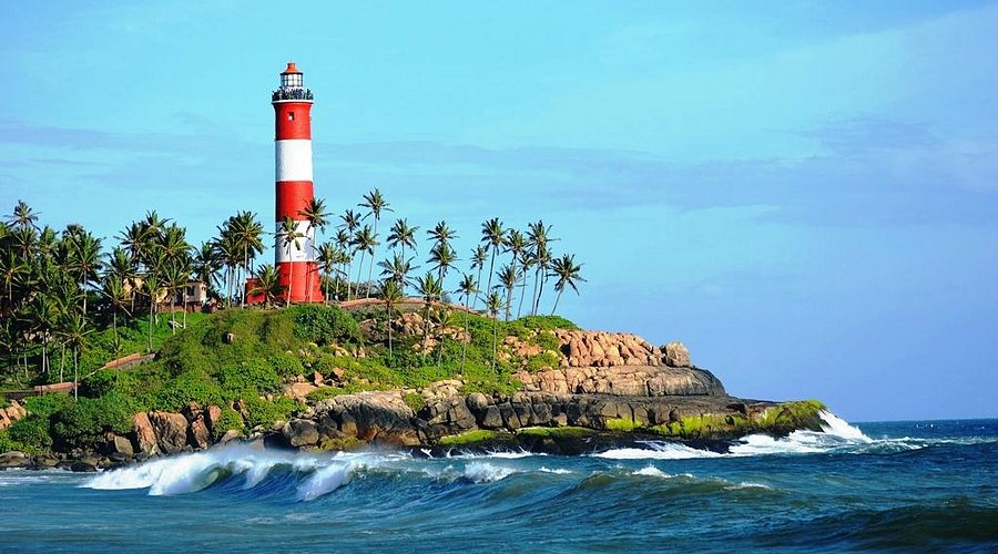 Lighthouse Beach Kovalam with shoreline and viewpoint tower