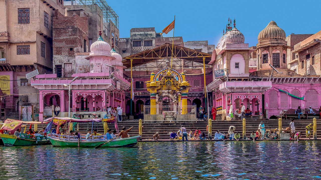 Pilgrims and boats at Vishram Ghat on Yamuna in Mathura