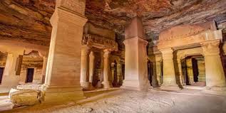 Bhartrihari Caves with meditation chambers carved into hillside