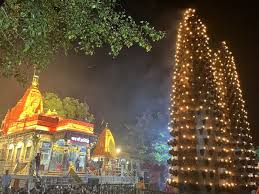 Harsiddhi Temple with seven illuminated lamps