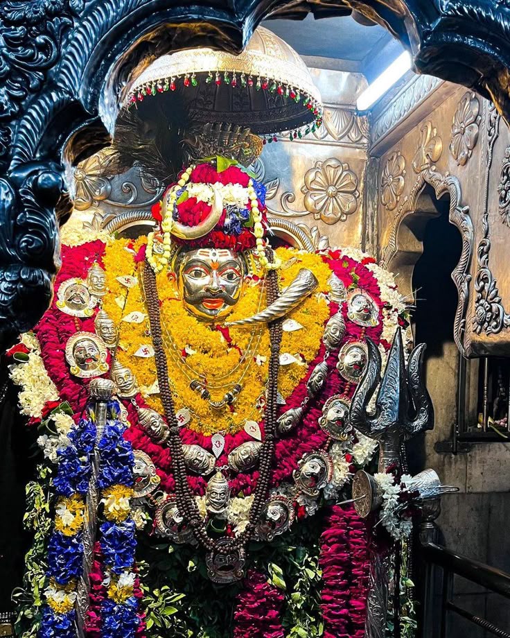 Kal Bhairav Temple devotees offering liquor to deity