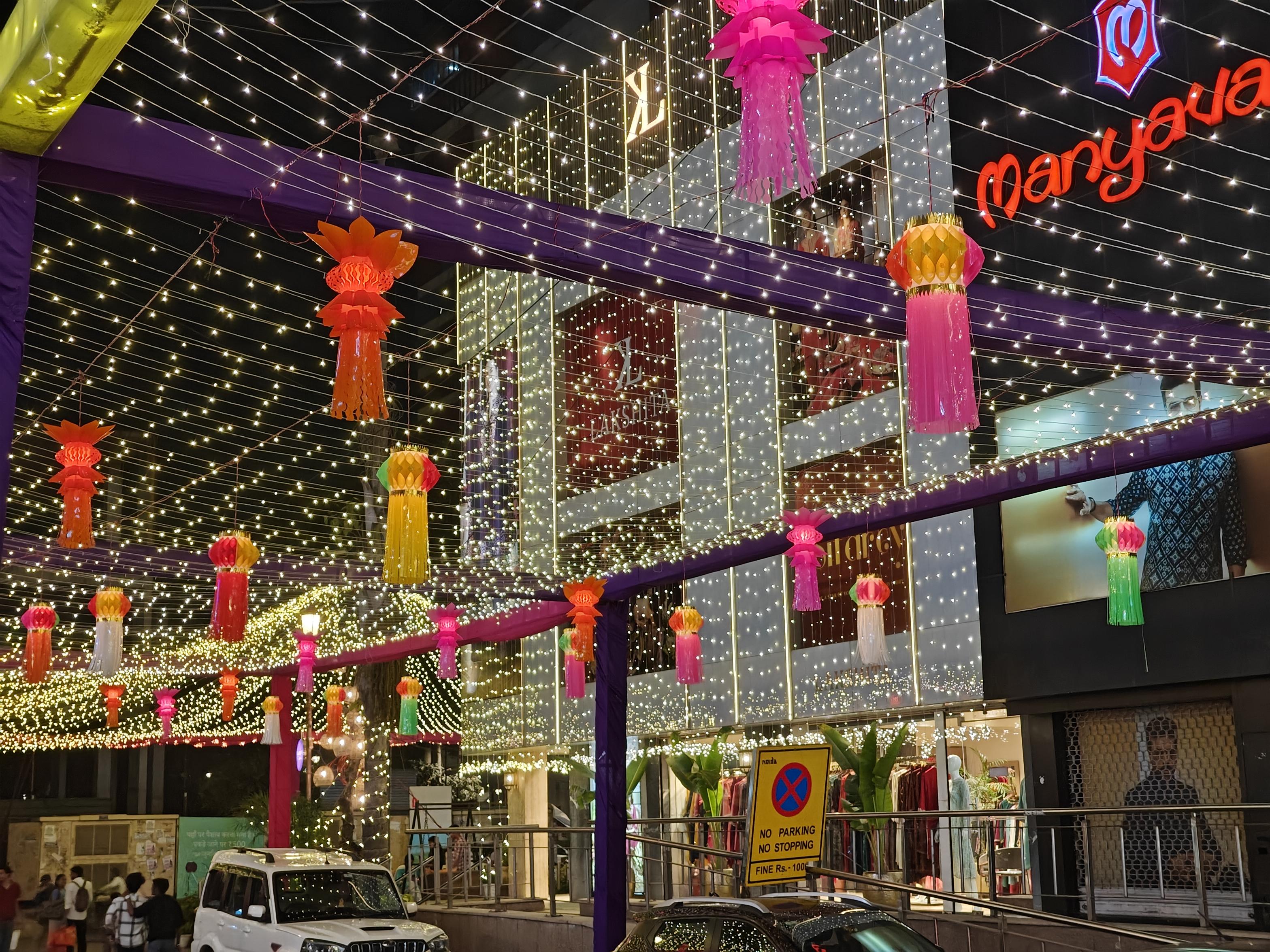 Evening crowd and lit shopping streets in Sector 18 Noida