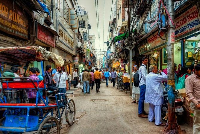 Busy heritage street view in Old Delhi with market movement