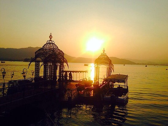 Sunset over Lake Pichola with Lake Palace reflecting in the water