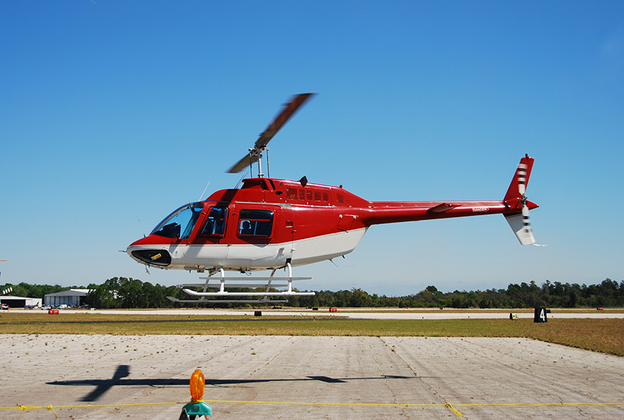 Helicopter hovering to contrast with fixed-wing airplane limits