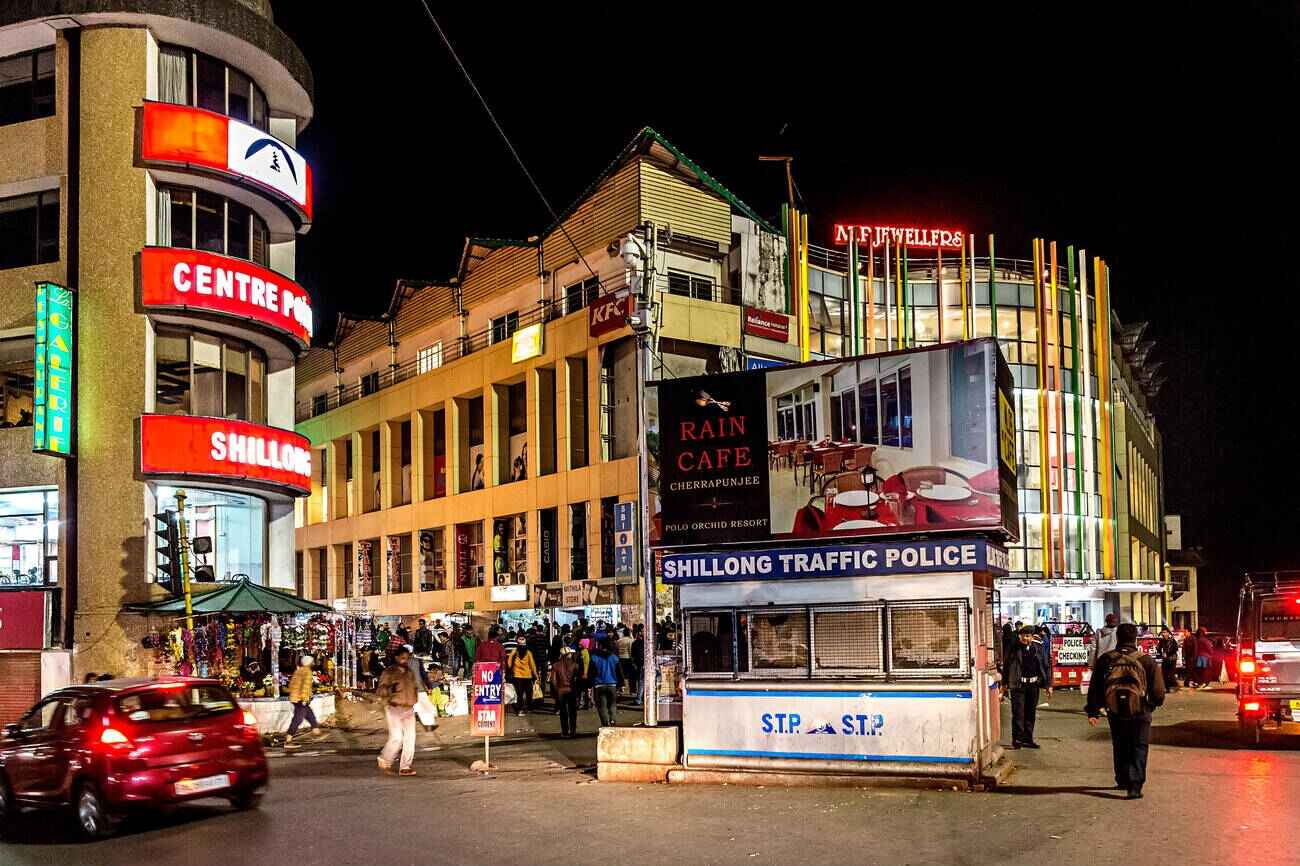 Evening lights and crowd movement in Police Bazar Shillong