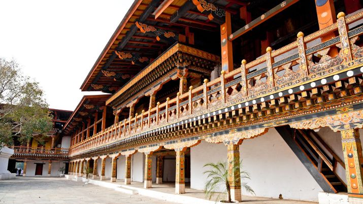 Detailed view of Punakha Dzong architecture showing wood carvings and paintings