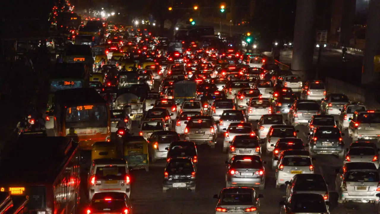 Night traffic flow and taillights on expressway corridor