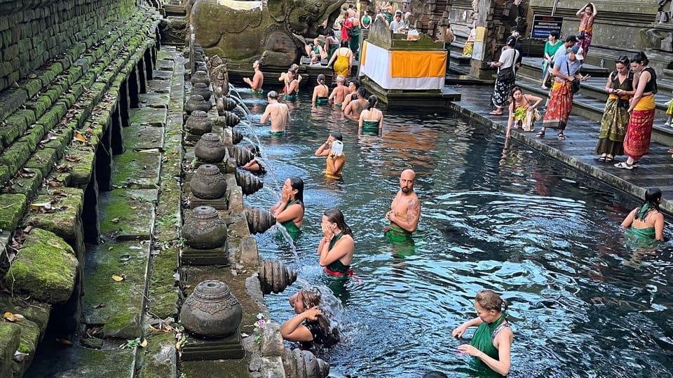 Purification pool at Pura Tirta Empul with 30 fountains