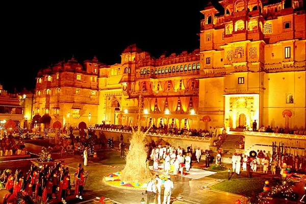 Udaipur City Palace decorated for Holi with Lake Pichola in background