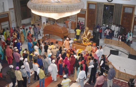 Devotees offering prayers at Ram Tirath Temple
