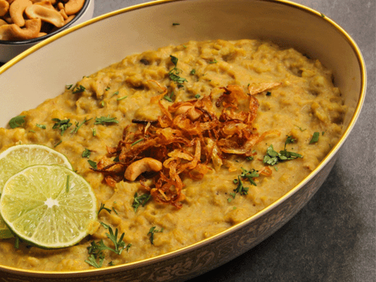 Haleem being prepared in a traditional large pot