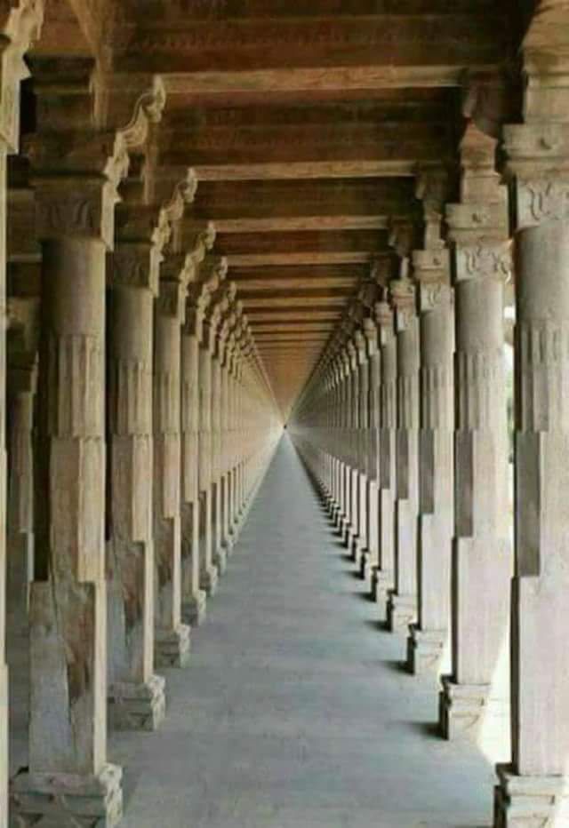 Intricate carvings on temple pillars