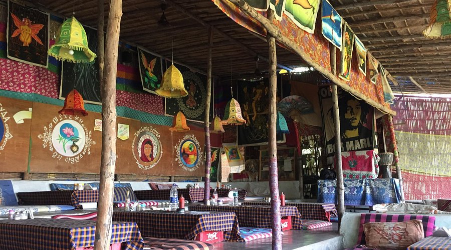 Dining street with cafes and restaurants in Hampi
