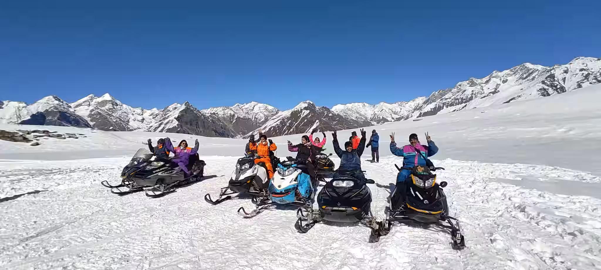 Tourists enjoying snow activities at Rohtang Pass