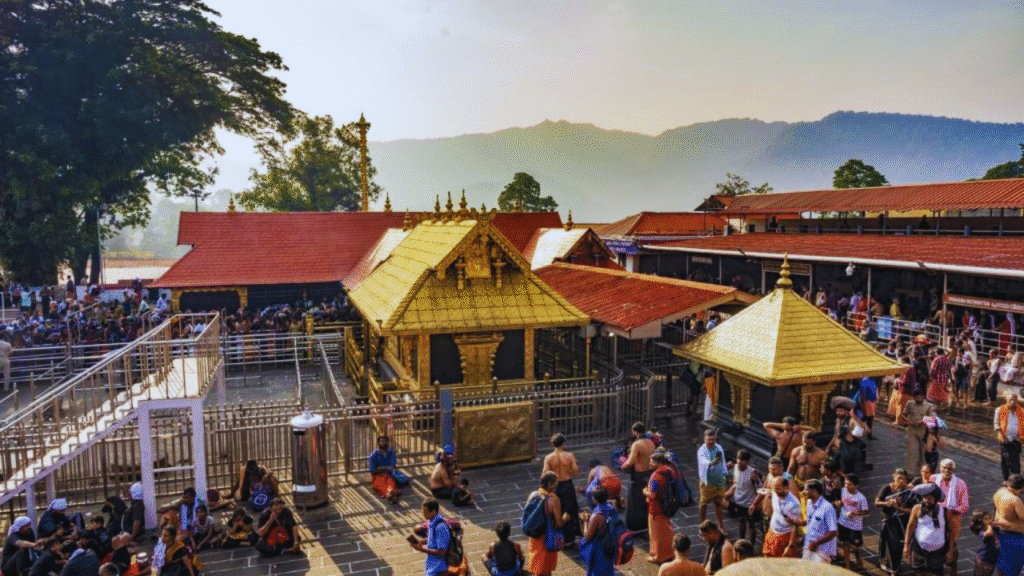 Devotees climbing the sacred eighteen steps at Sabarimala Temple
