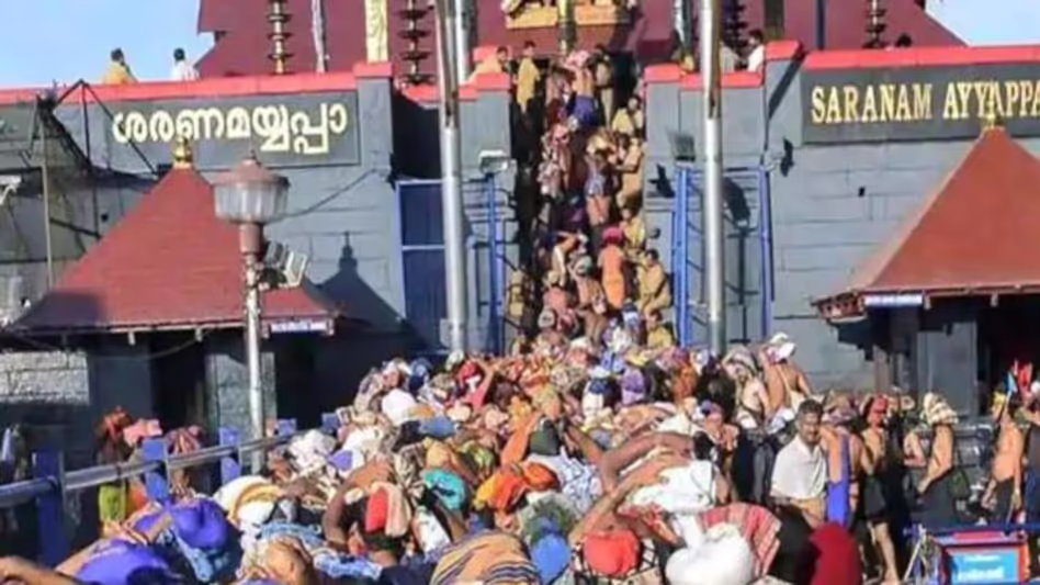 Devotees observing vratham wearing sacred mala and traditional attire